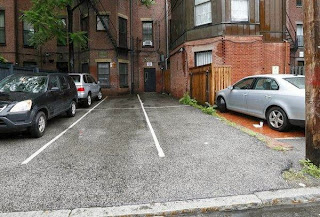 Bostonion Buys 2 Parking Spots for USD560 000