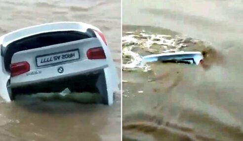 VIDEO:  Man Pushes BMW into River Because He Wanted a Jaguar